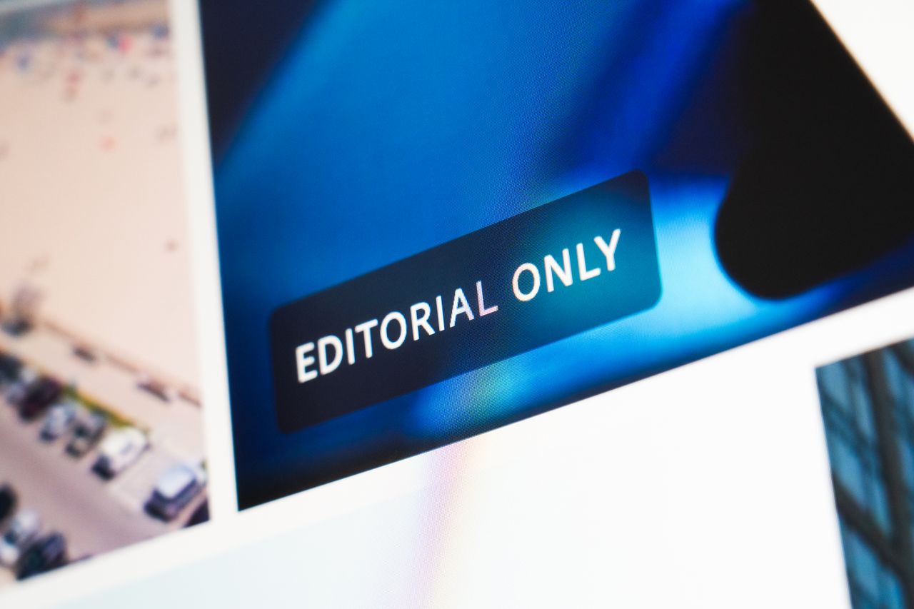 about-bg Close-up of 'Editorial Only' label on a digital display screen, emphasizing editorial content.